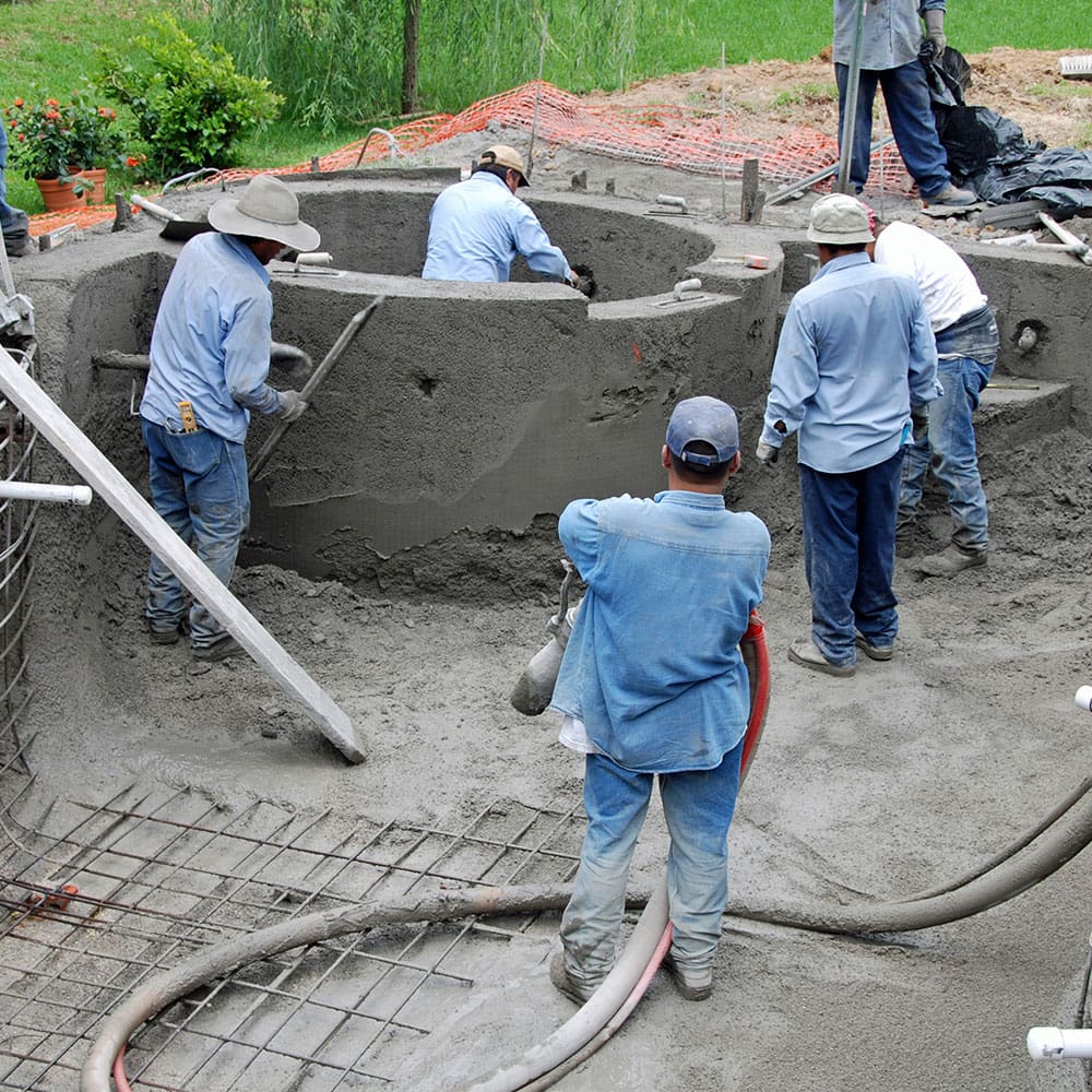 square_0080_Pools-&-Spas-Pool-&-Spa-Construction New in-ground pool under construction in a backyard